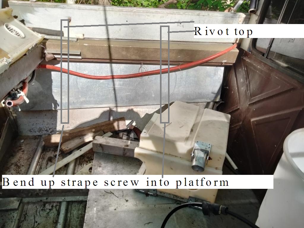 1Bend up strape screw into platform rivot top.jpg